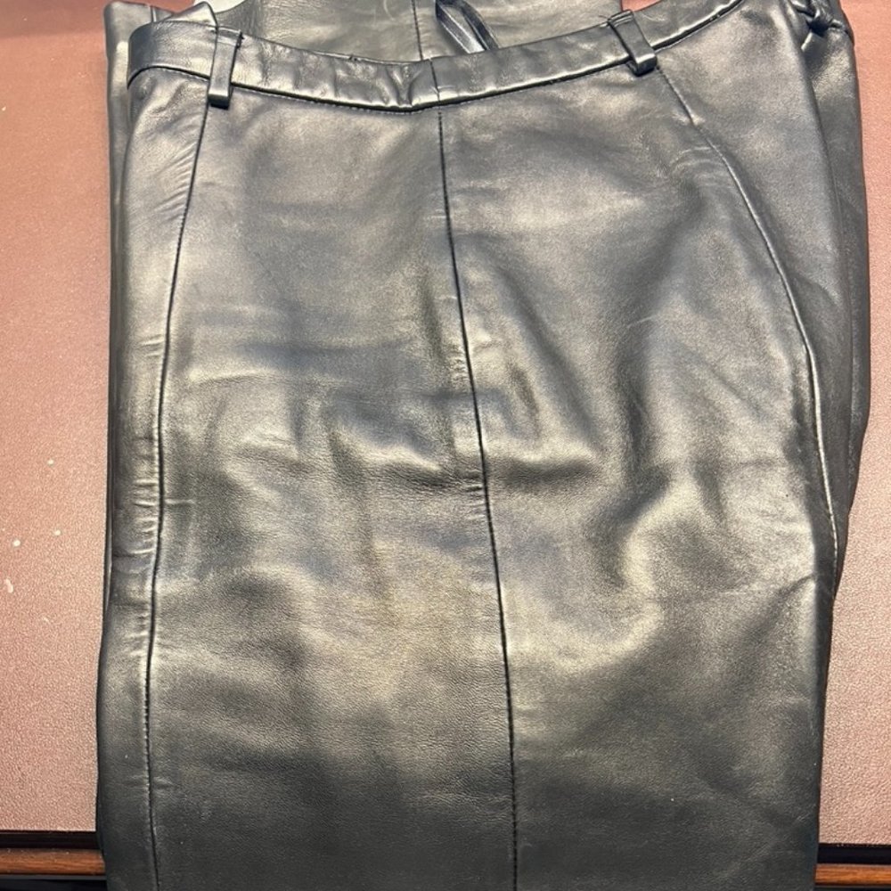 Black  very soft leather bell bottom pants.